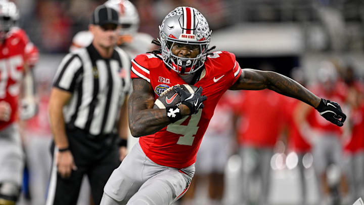 Ohio State Buckeyes wide receiver Jeremiah Smith (4) runs for a touchdown during the 2025 Cotton Bowl Ohio State Buckeyes wide receiver Jeremiah Smith (4) runs for a touchdown during the 2025 Cotton Bowl