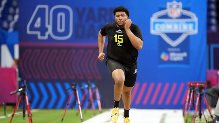 Feb 27, 2025; Indianapolis, IN, USA; Oregon defensive lineman Derrick Harmon (DL15) participates in drills during the 2025 NFL Combine at Lucas Oil Stadium. Mandatory Credit: Kirby Lee-Imagn Images