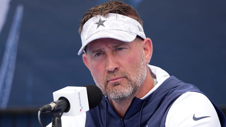 Jul 22, 2025; Oxnard, CA, USA; Dallas Cowboys coach Brian Schottenheimer during training camp press conference at the River Ridge Fields. Mandatory Credit: Kirby Lee-Imagn Images