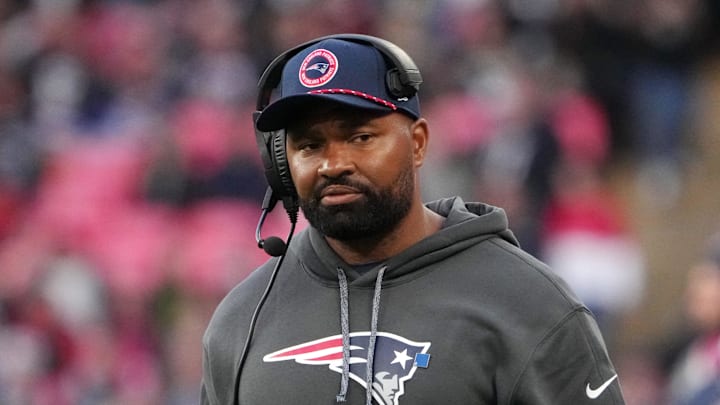 Oct 20, 2024; London, United Kingdom; New England Patriots coach Jerod Mayo watches from the sidelines against the New England Patriots in the second half of an NFL International Series game at Wembley Stadium. 