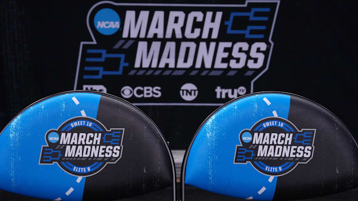 Team bench chairs with the March Madness Elite 8 and Sweet 16 logos Team bench chairs with the March Madness Elite 8 and Sweet 16 logos