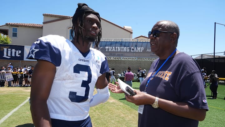USA Today Sports reporter Jarrett Bell interviews Dallas Cowboys receiver George Pickens at training camp 
