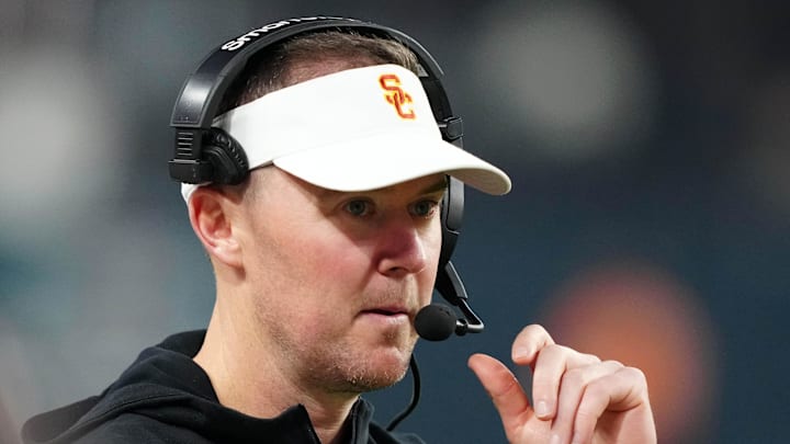 Dec 27, 2024; Las Vegas, NV, USA; Southern California Trojans head coach Lincoln Riley reacts against the Texas A&M Aggies in the second half at Allegiant Stadium. Mandatory Credit: Kirby Lee-Imagn Images
