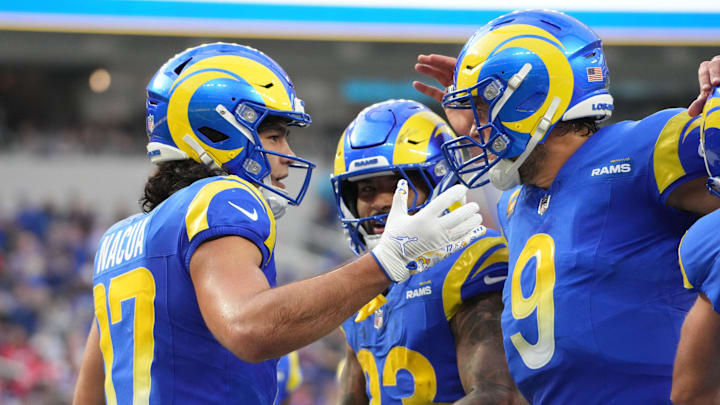 Dec 8, 2024; Inglewood, California, USA; Los Angeles Rams wide receiver Puka Nacua (17) celebrates with quarterback Matthew Stafford (9) and running back Kyren Williams (23) after scoring on a 4-yard touchdown run in the second quarter against the Buffalo Bills at SoFi Stadium. Mandatory Credit: Kirby Lee-Imagn Images Dec 8, 2024; Inglewood, California, USA; Los Angeles Rams wide receiver Puka Nacua (17) celebrates with quarterback Matthew Stafford (9) and running back Kyren Williams (23) after scoring on a 4-yard touchdown run in the second quarter against the Buffalo Bills at SoFi Stadium. Mandatory Credit: Kirby Lee-Imagn Images