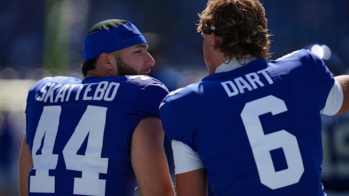 New York Giants running back Cam Skattebo (44) and New York Giants quarterback Jaxson Dart (6) warm up before a game against the Los Angeles Chargers at MetLife Stadium, Sep 28, 2025, East Rutherford, NJ, USA.