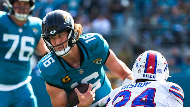 Jacksonville Jaguars quarterback Trevor Lawrence (16) scrambles during the second quarter in an NFL football AFC Wild Card playoff matchup, Sunday, Jan. 11, 2026, in Jacksonville, Fla. Bills lead 10-7 at the half over the Jaguars. [Doug Engle/Florida Times-Union]