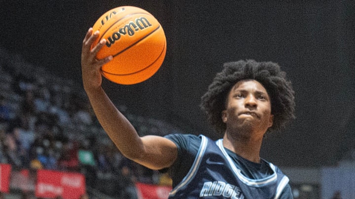 Ridgeland's Khameron Snow (23) shoots for two as Olive Branch's Reese Garrison (13) tries to block during the MHSAA Class 6A boys basketball final in Jackson, Miss., Saturday, March 2, 2024. Ridgeland's Khameron Snow (23) shoots for two as Olive Branch's Reese Garrison (13) tries to block during the MHSAA Class 6A boys basketball final in Jackson, Miss., Saturday, March 2, 2024.