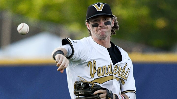 May 21 2024; Hoover, AL, USA; Vanderbilt shortstop Jonathan Vastine throws to first for an out against Florida at the Hoover Met on the opening day of the SEC Tournament.