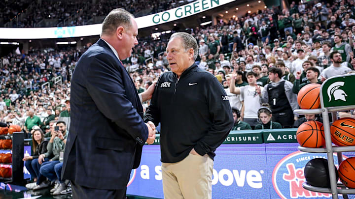 Michigan State's head coach Tom Izzo, right, shakes hands with Wisconsin's head coach Greg Gard before the game during on Sunday, March 2, 2025, at the Breslin Center in East Lansing.