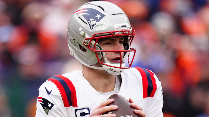 Jan 25, 2026; Denver, CO, USA; New England Patriots quarterback Drake Maye (10) drops back to pass against the Denver Broncos during the first half in the 2026 AFC Championship Game at Empower Field at Mile High.