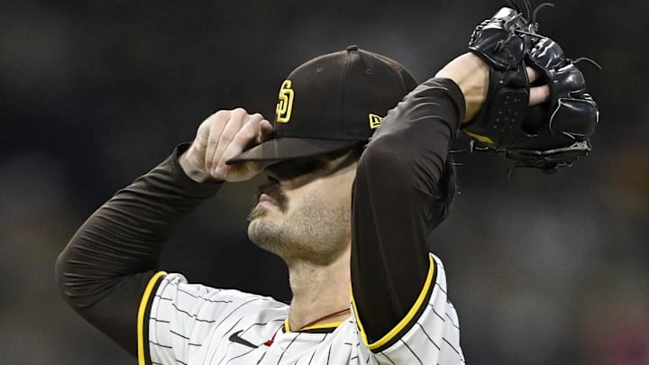 Oct 9, 2024; San Diego, California, USA; San Diego Padres pitcher Dylan Cease (84) reacts after a hit in the second inning against the Los Angeles Dodgers during game four of the NLDS for the 2024 MLB Playoffs at Petco Park.  Mandatory Credit: Denis Poroy-Imagn Images