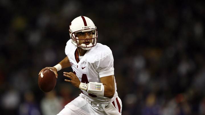 Sept 27, 2008; Seattle, WA, USA; Stanford Cardinal quarterback Tavita Pritchard (14) scrambles out of the pocket against the Washington Huskies during the first half at Husky Stadium. Stanford defeated Washington, 35-28. Mandatory Credit: Joe Nicholson-Imagn Images