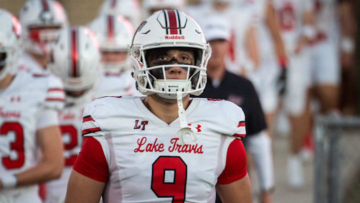Lake Travis defensive lineman Gus Cordova (9) leads the Cavaliers onto the field at Burger Stadium in Austin between the Lake Travis Cavaliers and Bowie Bulldogs, Sept. 27, 2024.