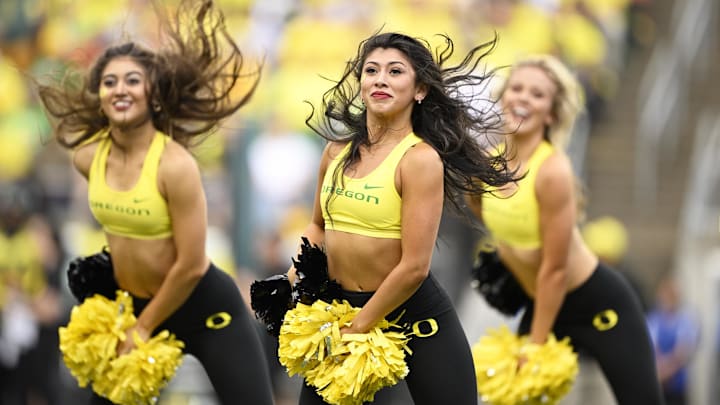 Oct 26, 2024; Eugene, Oregon, USA; Oregon Ducks cheerleaders perform during a time out in the second half in a game against the Illinois Fighting Illini at Autzen Stadium. Mandatory Credit: Troy Wayrynen-Imagn Images