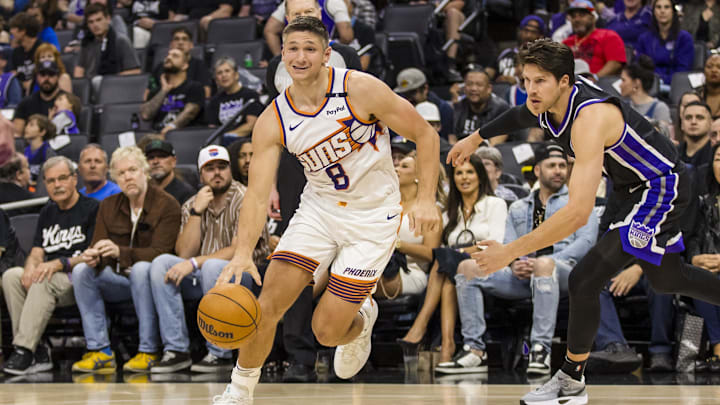 Apr 13, 2025; Sacramento, California, USA;  Phoenix Suns guard Grayson Allen (8) dribbles against the Sacramento Kings during the fourth quarter at Golden 1 Center. Mandatory Credit: John Hefti-Imagn Images