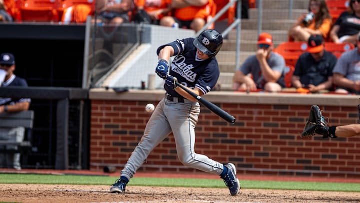 Dallas Baptist outfielder Jace Grady (29) hits during a game in the NCAA Stillwater Regional between the Oklahoma State Cowboys (OSU) and the Dallas Baptist Patriots at O'Brate Stadium in Stillwater, Okla., on Saturday, June 3, 2023.