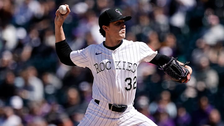 Apr 6, 2025; Denver, Colorado, USA; Colorado Rockies starting pitcher Chase Dollander (32) pitches in the first inning against the Athletics at Coors Field. Mandatory Credit: Isaiah J. Downing-Imagn Images