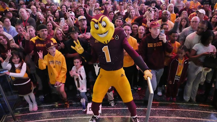 Sparky rallies ASU fans at the Georgia Aquarium during a pep rally before facing Texas in the Chick-fil-A Peach Bowl on Dec. 31, 2024. Sparky rallies ASU fans at the Georgia Aquarium during a pep rally before facing Texas in the Chick-fil-A Peach Bowl on Dec. 31, 2024.