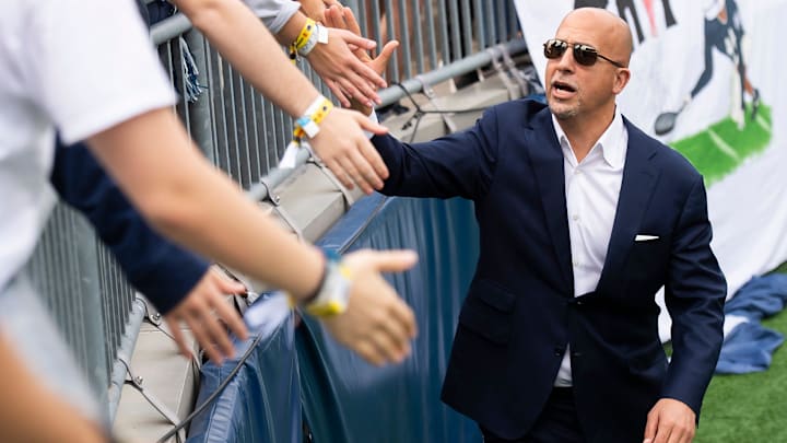 Penn State head football coach James Franklin greets members of the student section in Beaver Stadium