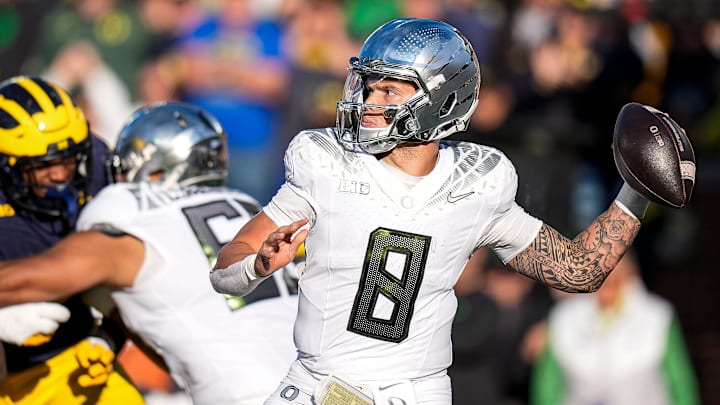 Oregon quarterback Dillon Gabriel (8) makes a pass against Michigan during the first half at Michigan Stadium in Ann Arbor on Saturday, Nov. 2, 2024.