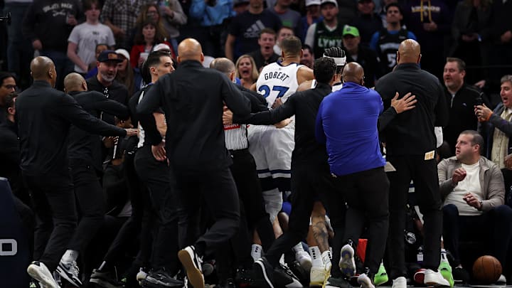 Minnesota Timberwolves and Detroit Pistons players get into a fight during the second quarter at Target Center in Minneapolis on March 30, 2025.