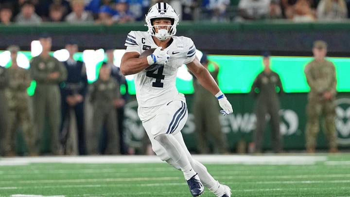 Sep 19, 2026; Fort Collins, Colorado, USA; BYU Cougars running back Lj Martin (4) runs the ball against the Colorado State Rams at Sonny Lubick Field at Canvas Stadium. Mandatory Credit: Andrew Rydland-Imagn Images Sep 19, 2026; Fort Collins, Colorado, USA; BYU Cougars running back Lj Martin (4) runs the ball against the Colorado State Rams at Sonny Lubick Field at Canvas Stadium. Mandatory Credit: Andrew Rydland-Imagn Images