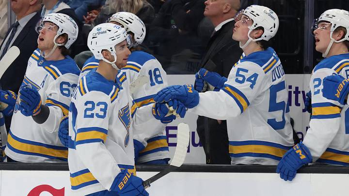 Apr 16, 2026; Salt Lake City, Utah, USA; St. Louis Blues defenseman Logan Mailloux (23) celebrates with teammates after scoring the go ahead goal against the Utah Mammoth during the third period at Delta Center. Mandatory Credit: Rob Gray-Imagn Images
