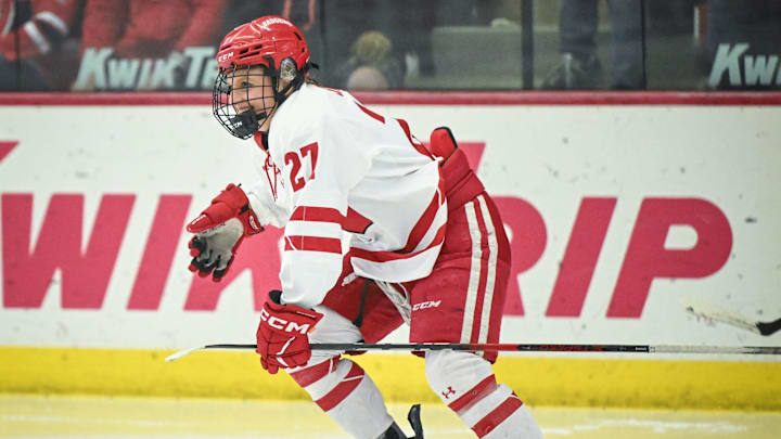 Wisconsin Badgers left wing Kirsten Simms (27) celebrates her goal early in the first period of a WCHA first-round game Saturday, March 1, 2025, at LaBahn Arena in Madison, Wisconsin. Wisconsin Badgers left wing Kirsten Simms (27) celebrates her goal early in the first period of a WCHA first-round game Saturday, March 1, 2025, at LaBahn Arena in Madison, Wisconsin.
