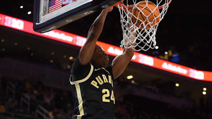 Purdue Boilermakers guard Gicarri Harris (24) dunks the ball. Purdue Boilermakers guard Gicarri Harris (24) dunks the ball.