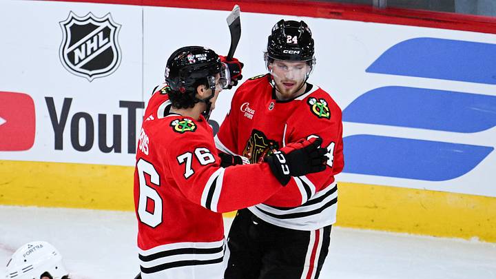 Sep 21, 2026; Chicago, Illinois, USA;  Chicago Blackhawks defenseman Bowen Byram (24) celebrates with  left wing Nick Lardis (76)  after he scored the game winning goal during the overtime period against the Minnesota Wild  at the United Center.  Mandatory Credit: Matt Marton-Imagn Images