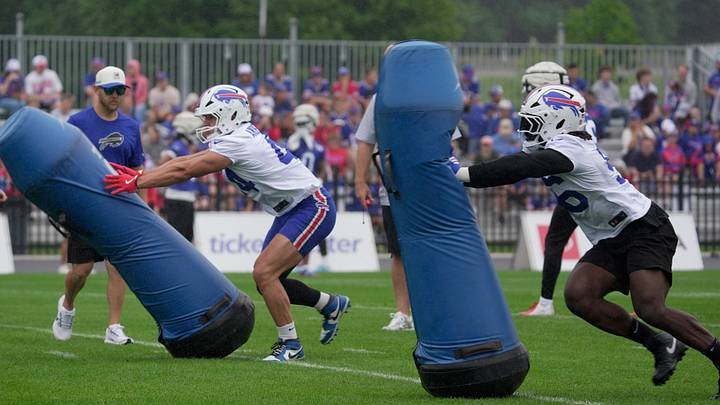 Buffalo Bills inside linebacker Joe Andreessen and EDGE rusher Javon Solomon hit the dummies during Bills training camp practice at St. John Fisher University in Pittsford, New York, on July 30, 2026. Buffalo Bills inside linebacker Joe Andreessen and EDGE rusher Javon Solomon hit the dummies during Bills training camp practice at St. John Fisher University in Pittsford, New York, on July 30, 2026.