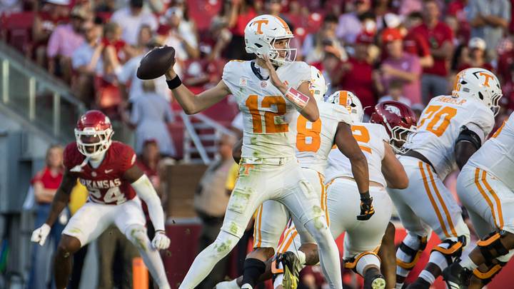 Oct 10, 2026; Fayetteville, Arkansas, USA; Tennessee Volunteers quarterback George MacIntyre (12) looks to throw during the third quarter against the Arkansas Razorbacks at Donald W. Reynolds Razorback Stadium. Mandatory Credit: Brett Rojo-Imagn Images Oct 10, 2026; Fayetteville, Arkansas, USA; Tennessee Volunteers quarterback George MacIntyre (12) looks to throw during the third quarter against the Arkansas Razorbacks at Donald W. Reynolds Razorback Stadium. Mandatory Credit: Brett Rojo-Imagn Images