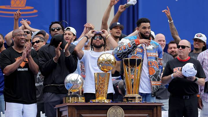 New York Knicks head coach Mike Brown (left to right) and forward OG Anunoby and guard Jalen Brunson and center Karl-Anthony Towns and team president Leon Rose stand for the national anthem during a ceremony at New York City Hall following their NBA championship parade. Ma