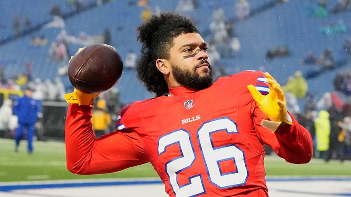 Dec 28, 2025; Orchard Park, New York, USA; Buffalo Bills running back Ty Johnson (26) throws the ball during warmups before the game against the Philadelphia Eagles at Highmark Stadium. Dec 28, 2025; Orchard Park, New York, USA; Buffalo Bills running back Ty Johnson (26) throws the ball during warmups before the game against the Philadelphia Eagles at Highmark Stadium.