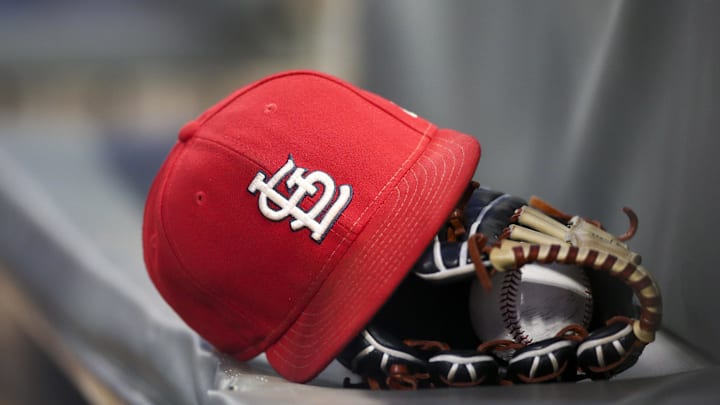 Sep 17, 2018; Atlanta, GA, USA; Detailed view of a St. Louis Cardinals hat and glove in the dugout against the Atlanta Braves in the first inning at SunTrust Park. Mandatory Credit: Brett Davis-Imagn Images
Sep 17, 2018; Atlanta, GA, USA; Detailed view of a St. Louis Cardinals hat and glove in the dugout against the Atlanta Braves in the first inning at SunTrust Park. Mandatory Credit: Brett Davis-Imagn Images