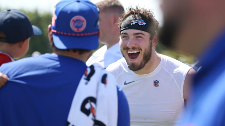 Bills tight end Dalton Kincaid visits with staff and their families on the sidelines during the opening day of Buffalo Bills training camp at St. John Fisher University Wednesday, July 23, 2025 in Pittsford.