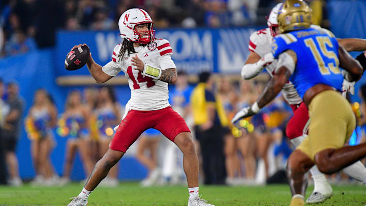 TJ Lateef winds up to pass against the UCLA Bruins during the second half.