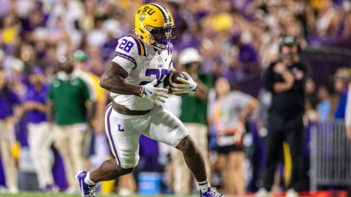 Sep 20, 2025; Baton Rouge, Louisiana, USA; LSU Tigers running back Kaleb Jackson (28) runs against the Southeastern Louisiana Lions during the first half at Tiger Stadium. Mandatory Credit: Stephen Lew-Imagn Images Sep 20, 2025; Baton Rouge, Louisiana, USA; LSU Tigers running back Kaleb Jackson (28) runs against the Southeastern Louisiana Lions during the first half at Tiger Stadium. Mandatory Credit: Stephen Lew-Imagn Images