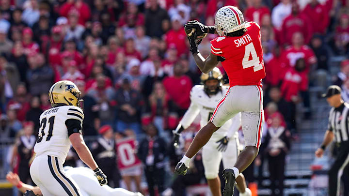 Ohio State Buckeyes wide receiver Jeremiah Smith (4) catches a pass against the Purdue Boilermakers in the first half at Ohio Stadium on Saturday, Nov. 9, 2024 in Columbus, Ohio.