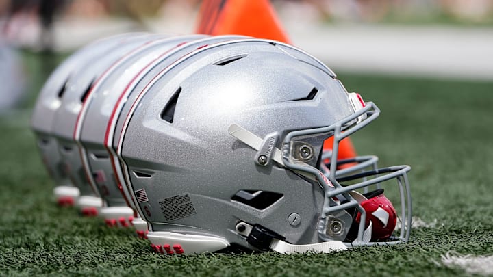 Sep 2, 2023; Bloomington, Indiana, USA; Ohio State Buckeyes helmets sit on the sideline prior to the NCAA football game at Indiana University Memorial Stadium. Ohio State won 23-3.