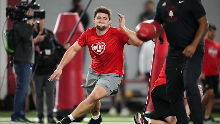Ohio State Buckeyes defensive end Caden Curry (92) runs during Pro Day for NFL scouts at the Woody Hayes Athletics Center on March 25, 2026.