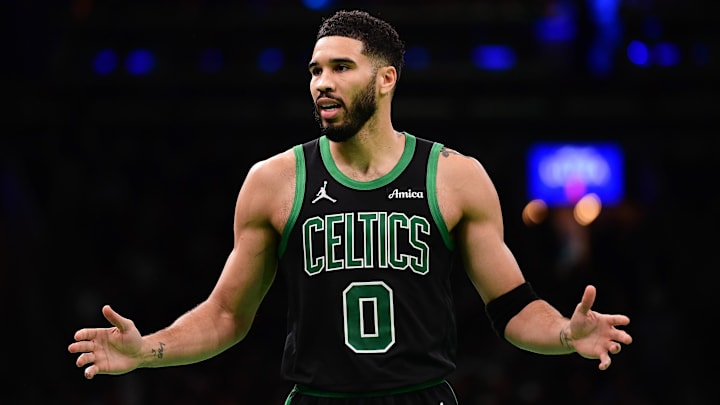 Nov 19, 2024; Boston, Massachusetts, USA;  Boston Celtics forward Jayson Tatum (0) questions a non call to the official during the second half against the Cleveland Cavaliers at TD Garden. Mandatory Credit: Bob DeChiara-Imagn Images