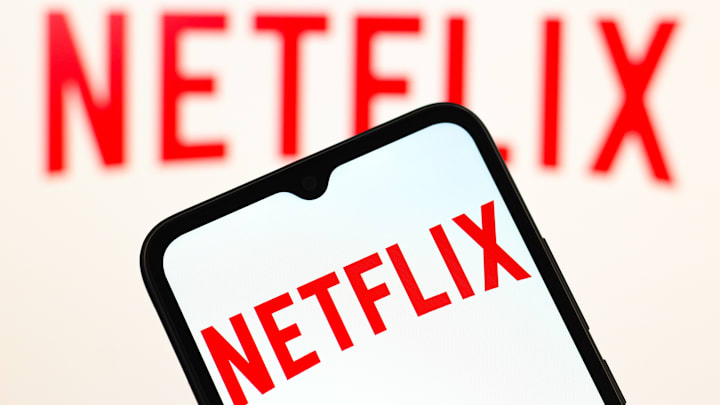 In this photo illustration, the Netflix logo is seen...