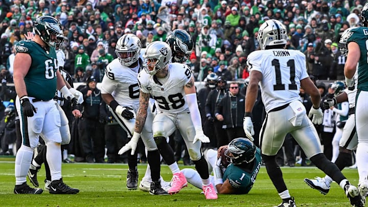 Dec 14, 2025; Philadelphia, Pennsylvania, USA; Las Vegas Raiders defensive end Maxx Crosby (98) celebrates his sacks of Philadelphia Eagles quarterback Jalen Hurts (1) during the second quarter at Lincoln Financial Field. Mandatory Credit: Eric Hartline-Imagn Images