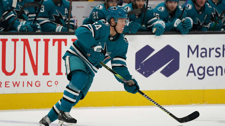 Jan 27, 2025; San Jose, California, USA;  San Jose Sharks center Mikael Granlund (64) looks to pass the puck in the first period against the Pittsburgh Penguins at SAP Center at San Jose. Mandatory Credit: David Gonzales-Imagn Images