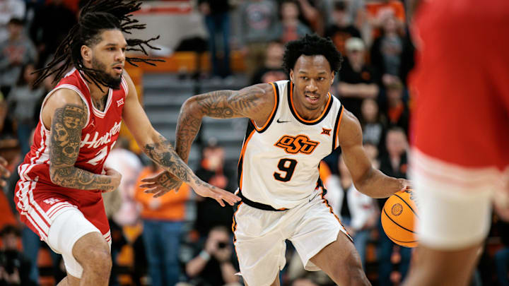 Mar 7, 2026; Stillwater, Oklahoma, USA; Oklahoma State Cowboys guard Anthony Roy (9) brings the ball up court during the first half against the Houston Cougars at Gallagher-Iba Arena. Mandatory Credit: William Purnell-Imagn Images