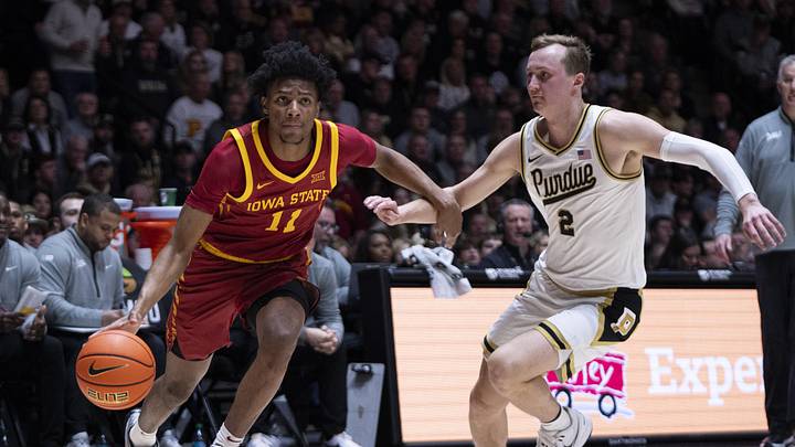 Dec 6, 2025; West Lafayette, Indiana, USA; Iowa State Cyclones guard Dominick Nelson (11) dribbles past Purdue Boilermakers guard Fletcher Loyer (2) during the first half at Mackey Arena.