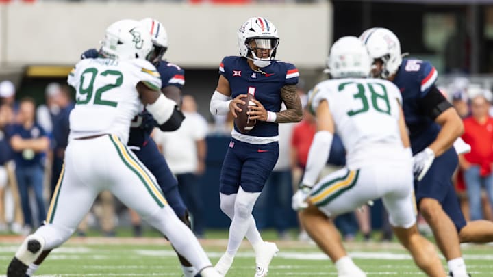 Nov 22, 2025; Tucson, Arizona, USA; Arizona Wildcats quarterback Noah Fifita (1) against the Baylor Bears in the first half at Casino Del Sol Stadium. Mandatory Credit: Mark J. Rebilas-Imagn Images Nov 22, 2025; Tucson, Arizona, USA; Arizona Wildcats quarterback Noah Fifita (1) against the Baylor Bears in the first half at Casino Del Sol Stadium. Mandatory Credit: Mark J. Rebilas-Imagn Images