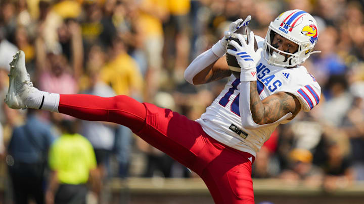 Sep 6, 2025; Columbia, Missouri, USA; Kansas Jayhawks tight end DeShawn Hanika (18) catches a touchdown pass during the first half against the Missouri Tigers at Faurot Field at Memorial Stadium. Mandatory Credit: Jay Biggerstaff-Imagn Images