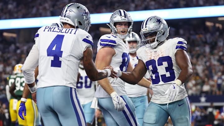 Dallas Cowboys running back Javonte Williams celebrates with quarterback Dak Prescott after scoring a touchdown. Dallas Cowboys running back Javonte Williams celebrates with quarterback Dak Prescott after scoring a touchdown.